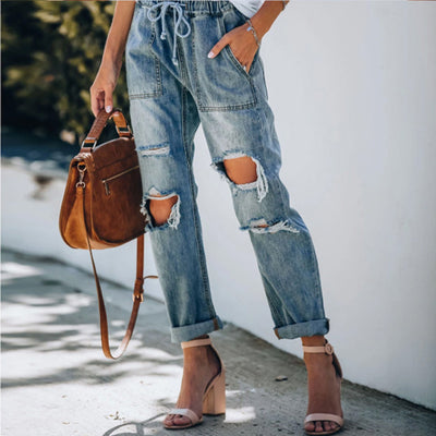 Ripped lace-up white trouser jeans